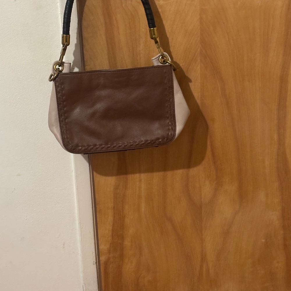 The Sak Brown, Cream and black purse